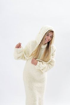 "Make a definite statement with your style with our wool hoodie sweater dress. Crafted from high quality wool , that's comfortable and elegant at the same time, this design has a distinctive and stylish appeal. DETAILS - Made from 100% Natural Premium wool 2.5 kg 3 strands -100 % handmade knit ,our own production - Hoddie dress - The model is 170 cm tall (regular S) - The sweater on picture is size XL - As mostly all models in our shop the sweater is loose fit - Color on photo - beige See our co Cozy Cream Sweater Dress For Fall, Winter White Long Sleeve Sweater Dress, Casual Wool Sweater Dress For Winter, Cozy Fitted Sweater Dress With Chunky Knit, Cream Knit Sweater Dress For Winter, Cozy Knitted Beige Dresses, Long Cream Sweater Dress For Winter, Winter Beige Knitted Sweater Dress, Cream Knitted Sweater Dress For Fall