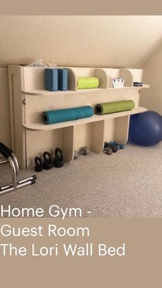 there is a shelf with yoga mats and exercise balls on it in the corner of this room