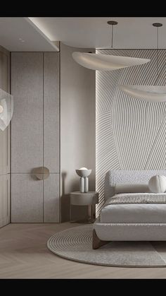 a large white bed sitting inside of a bedroom next to a tall wall mounted clock