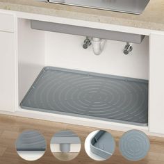 a kitchen sink with the door open to reveal an under - cabinet storage compartment for cooking utensils