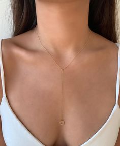 This gorgeous Circle Lariat Necklace is available in gold filled and sterling silver. The necklace can be worn on it's own or can easily be layered with other chokers and necklaces. Wear this to any occasion and be ready to shine! This item is also referred to as Y Necklace. MEASUREMENTS The length of the Circle Lariat Necklace is 16 inches and a 3.5 inch drop. The circle pendant measures 10mm in diameter. Each necklace comes with an additional 2.5-inch extender chain to easily adjust the length Luxury Lariat Necklace For Anniversary, Iced Out, Gold Bridesmaid Jewelry, Necklace Long Gold, Long Gold Necklace, Gray Jewelry, Pendant Diamond, Jewelry Design Inspiration, Layered Necklace Set