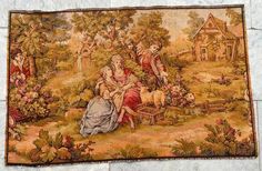 an old tapestry with people and animals in the grass near a house on a stone wall