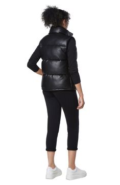 Timeless channel quilting adds a classic look to this puffer vest to keep you cozily warm. 25.5" length (size S) Stand collar Shell: 100% viscose; fill: 100% polyester Hand wash, line dry Imported Model stats: 5'10" height, 32" bust, 25" waist, 36" hip. Model is wearing size S. Casual Black Leather Puffer Jacket, Black Down Vest For Fall, Fitted Quilted Vest For Fall, Quilted Fitted Vest For Fall, Leather Puffer Vest, Leather Puffer, Marc New York, Puffer Vest, Classic Looks