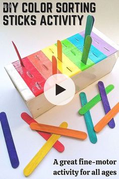 an image of colorful pops sticks in the shape of a box with words on it