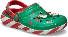 Cozy up this holiday season with the Mickey Mouse Holiday Lined Clog. This festive style features a cheerful Christmas print on the upper topped with 6 exclusive Jibbitz™ charms. Snuggle up with a soft, fuzzy interior lining that makes these shoes the perfect pick for staying in by the fire or going out holiday shopping.  Mickey Mouse Holiday Lined Clog Details:    The legendary Classic Clog, now with a warm, fuzzy liner   Mickey Mouse festive printed upper   6 exclusive Jibbitz™ charms   Incred Minnie Y Mickey Mouse, Wip Bag, Crocs Jibbitz, Men's Beanies, Film Disney, Mickey Christmas, Mickey Y Minnie, Crocs Classic Clogs, Clog Slippers