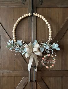 a wooden door with a wreath hanging on it