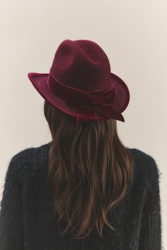 The Glenroy hat embodies refined style with its structured traditional cowboy crown and slim upturned brim. A draped velvet bow at the back adds a sophisticated contrast, while the velvet-piped edge completes the design with subtle texture. Crafted from premium western weight felt, it blends sophistication with a distinctly feminine charm. Velvet Aesthetic, Holiday 2024, Velvet Hat, Velvet Bow, Refined Style, Subtle Textures, Real Brides, Bridal Collection, Piping