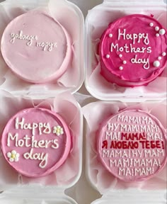 four decorated mothers day cakes in pink and white trays with writing on the frosting