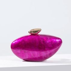 Make a stunning statement this season with our Glamour Boho Pearl Clutch Bag! This exquisite accessory, crafted from high-quality acrylic, features a unique egg shape that embodies both elegance and modern design. The bright fuchsia hue, complemented by a lustrous pearl effect, adds a touch of luxurious and romantic flair perfect to bring a sophisticated finish to your Boho Chic ensemble! ~ We love the dazzling fuchsia tone combined with elegant gold accents and the stylish unique egg shape maki Pearl Clutch Bag, Boho Chic Accessories, Acrylic Bag, Pearl Clutch, Acrylic Shapes, Wedding Purse, Party Purse, Pearl Hoop Earrings, Cute Purses