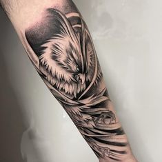 an eagle tattoo on the arm and leg