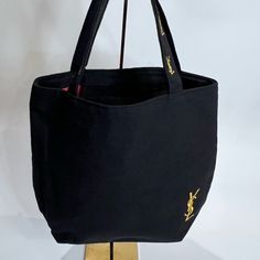 Nwot, There Are No Call Outs. This Tote Is So Cute & Classy. Black Bucket Bag With Branded Hardware And Top Handle, Saint Laurent Tote, Shopping Tote Bags, Suede Tote Bag, Vintage Ysl, Suede Tote, Yves Saint Laurent Bags, Purple Leather, Shopper Tote