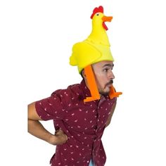 a man wearing a rubber ducky hat