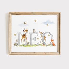 the word leo written in watercolor and surrounded by deer, bees, and butterflies