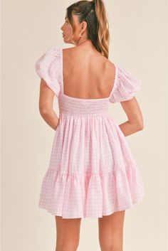 Sweet ruffles and a mesmerizing gingham print enliven this cotton minidress punctuated with a front tie and pretty puff sleeves with a sweet heart neckline. • Short Puff Sleeves• Front Ribbon Tie• Sweetheart Neck Line• Lined• Smocked Back�• Ruffled Hem Sweetheart Neck Line, Sweet Heart Neckline, Shopping Wishlist, Pink Polka Dot Dress, Hoco Dress, Rush Dresses, Mini Sundress, Church Dresses, Dress Inspo