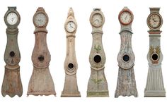 an assortment of old clocks in different styles