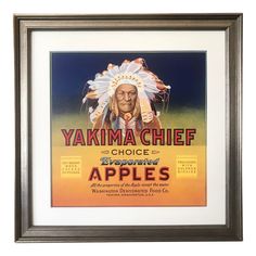 an advertisement for the yakim chief apples is displayed in a framed black wood frame