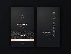 two black and gold business cards with the word rockett on one side and an image of