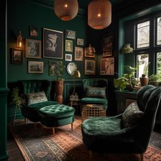 a living room with green walls and pictures on the wall, two chairs in front of them