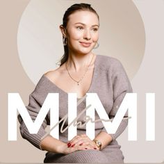 a woman with her arms crossed in front of the word mmm on a white background