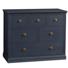 a dark blue dresser with brass handles and knobs on the top drawer, against a white background