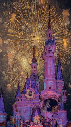 fireworks in the sky above a castle with turrets