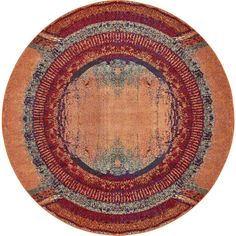 a round rug with an orange and blue design on the center, surrounded by multicolored circles