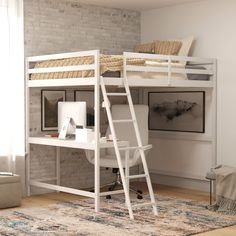 a loft bed with a desk underneath it and a ladder up to the top bunk