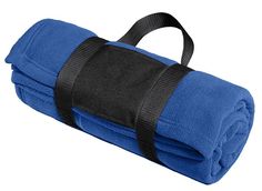 the blue blanket is folded and ready to be used as a gym mat or yoga mat