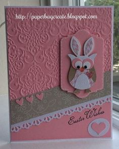 a pink card with an owl on it