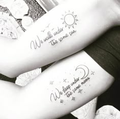 two girls with matching tattoos on their arms that say we walk under the same sun