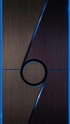 a shiny metal background with a blue circle in the center and black ring around it