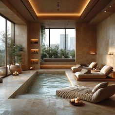 an indoor spa with candles lit up on the floor and large windows overlooking the city