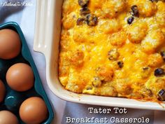 a casserole dish with eggs in it next to an egg tray