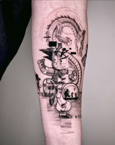 a person with a tattoo on their leg that has an image of mickey mouse in it