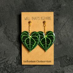 These cute lightweight earrings are a double sided design! Same design front and back. The leaf is about an inch long and are made with polystyrene plastic and resin for a shiny durable finish. The earring pin on the earring posts are 304 grade stainless steel.  All earrings are handcrafted and may feature minor imperfections. However, I always strive to create a meticulously finished, polished product. Botanical Leaf-shaped Jewelry For Gifts, Leaf-shaped Brass Earrings As Gift, Leaf-shaped Brass Earrings For Gift, Plant Lover Gifts, Anthurium Clarinervium, Fern Earrings, Handmade Leaf-shaped Botanical Earrings, Earring Pins, Plant Jewelry