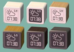 four cubes with different weather symbols on them, all showing the same time and temperature