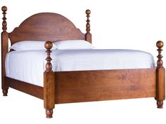 a wooden bed frame with white sheets and pillows on the headboard, in front of a white background