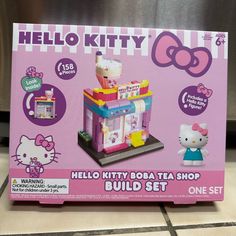 hello kitty build set in the box with instructions on it and an image of a hello kitty doll