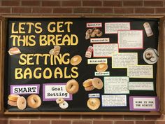 a bulletin board with donuts on it that says, let's get this bread setting bagels