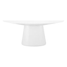 a white table sitting on top of a white floor