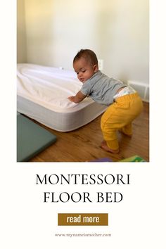 a baby crawling on top of a bed with the words montessori floor bed read more