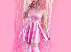 "Sparkling Shiny Skater dress that has a gorgeous holographic Pink silver mermaid skin finish that reflects the light in shards of rainbows and sparkles! Made with super stretchy Spandex. The four way stretch spandex is very comfortable and figure flaunting.  Size Chart: Extra Small: Bust 31\"-32\" / Waist 24\"-25\" / Hips 33\"-35\"  Small: Bust 33\"-34\" / Waist 26\"-28\" / Hips 36\"-37\" Medium: Bust 35\"-37\" /Waist 28\"-31\" / Hips 38\"-40\" Large: Bust 39\"-41\" / Waist 32\"-34\"/ Hips 41\" Holographic Dress, Mermaid Skin, Holographic Fabric, Dress Sparkle, Silver Mermaid, Rave Wear, Festival Dress, Large Bust, Small Bust