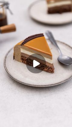 a piece of cake sitting on top of a plate next to a spoon and fork