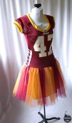 a dress made to look like a football jersey with the number 42 on it and tulle skirt