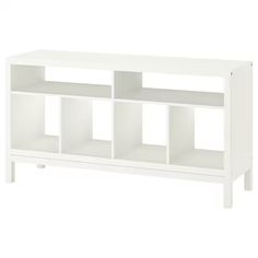 a white bookcase with four shelves on each side