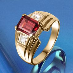 Crafted with precision and care, this distinguished ring exudes a commanding presence. The rich, deep red Garnet at its heart symbolises passion and vitality, drawing the eye and inviting intrigue. Flanking it, White Topaz stones adds a touch of opulence, providing a sparkling contrast that captures attention from every angle. Finely crafted from sterling silver, finished in 18k yellow gold, bestows a warm regal glow. Make a lasting impression, seize the moment, and wear your confidence with pri Formal Red Birthstone Ring With Polished Finish, Formal Red Polished Birthstone Ring, Classic Red Promise Ring, Classic Red Garnet Signet Ring, Classic Red Jewelry For Promise, Classic Red Birthstone Ring With Polished Finish, Modern Red Gemstone Ring, Modern Red Garnet Rings, Fine Jewelry Red Birthstone Ring With Polished Finish