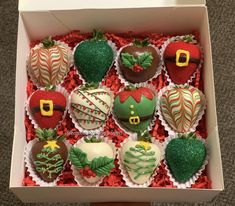 a box filled with assorted decorated chocolates