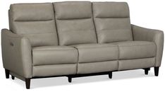 the reclining sofa has three seats and is light gray leather with dark wood legs