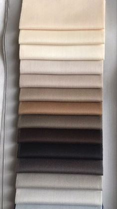 the color swatches are lined up in different colors and sizes, including black, white, blue, beige, gray