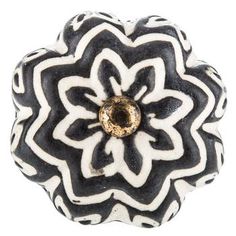 black and white flower bead with gold center